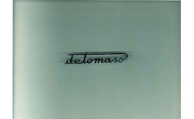 Scritta De Tomaso cromata